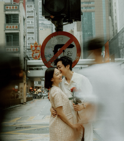 A couple holding a bouquet