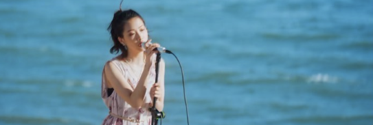 Seaside performance, a frame from film work